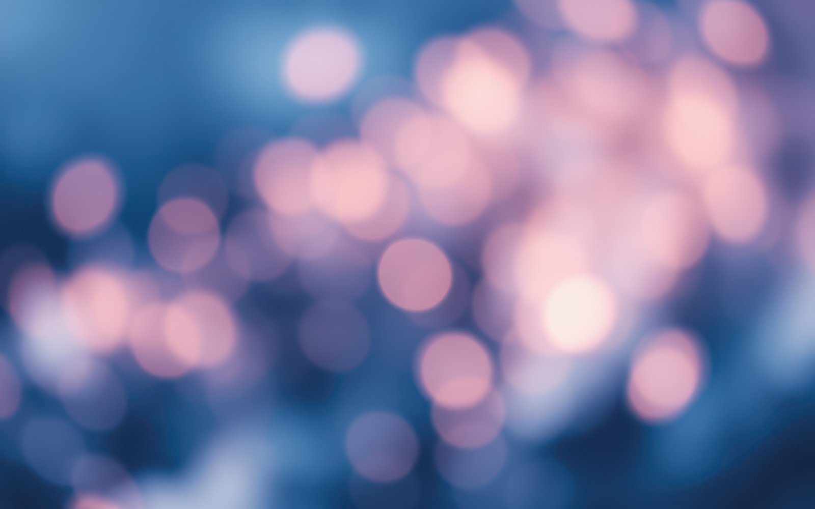 Colorful bokeh lights create a dreamy atmosphere with soft hues and a calming effect at night
